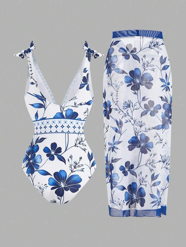 SHEIN Swim Oasis Conjunto de maiô de uma peça e saia de cobertura com estampa floral, nó de ombro e ideal para as férias de verão das mulheres na praia